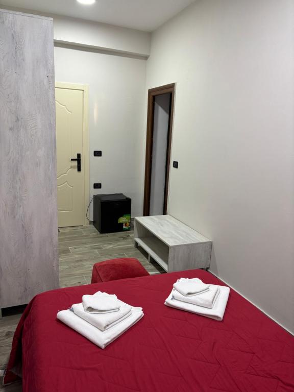 Postel nebo postele na pokoji v ubytování Hotel Vila Stefa