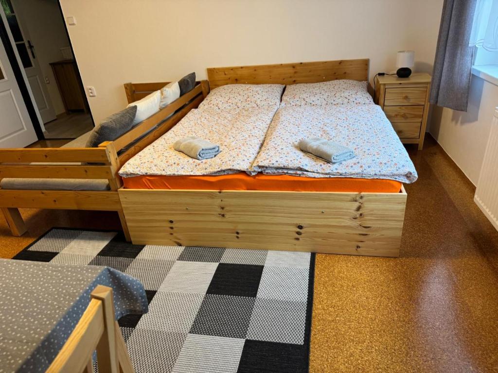 Postel nebo postele na pokoji v ubytování Penzion Lukeš