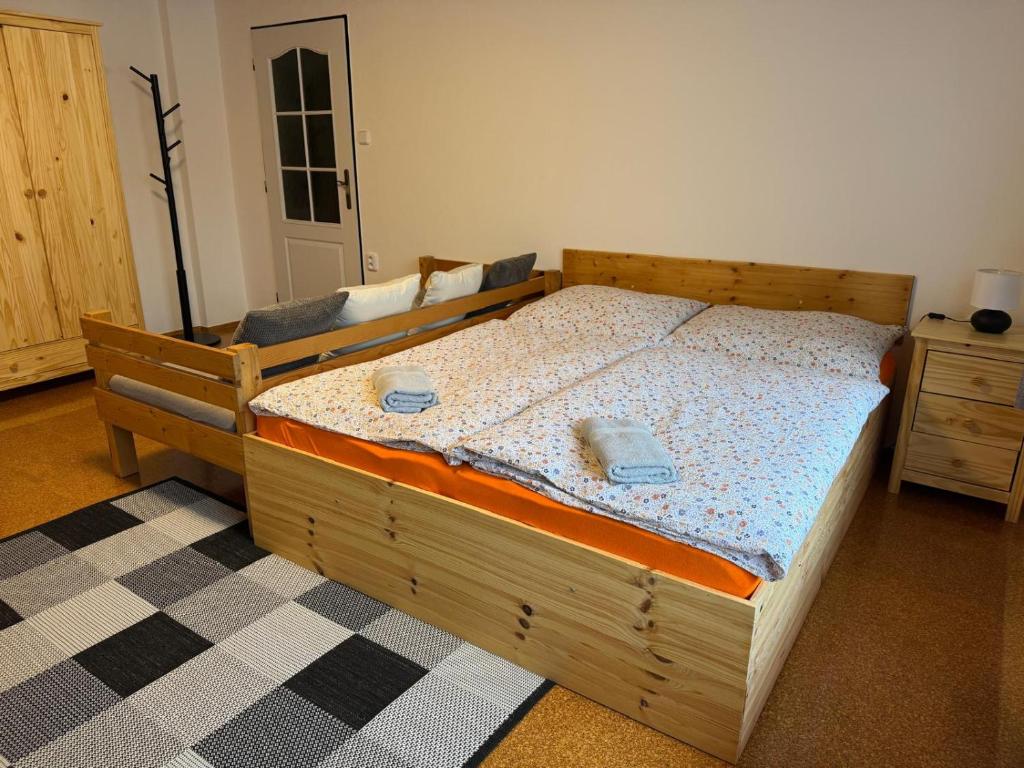 Postel nebo postele na pokoji v ubytování Penzion Lukeš