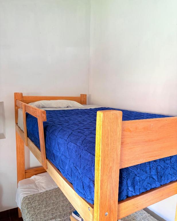 Postel nebo postele na pokoji v ubytování hostel arcoiris urubamba
