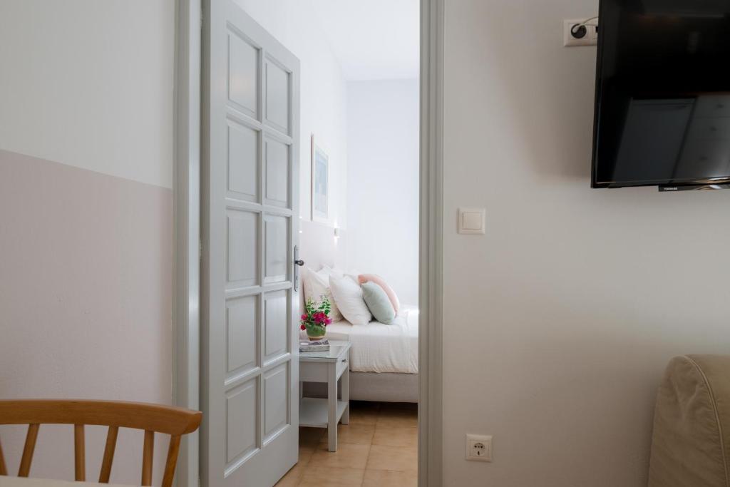 Postel nebo postele na pokoji v ubytování Nautilus Apartments