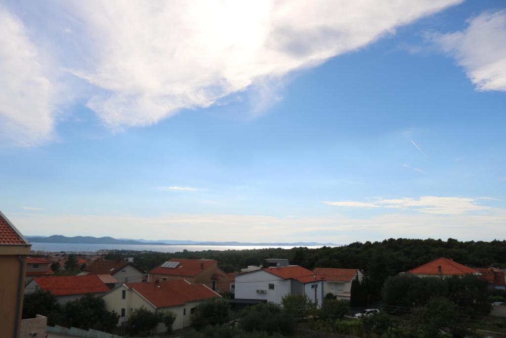 a view of a city with houses and the sky at Apartment Mimi in Zadar