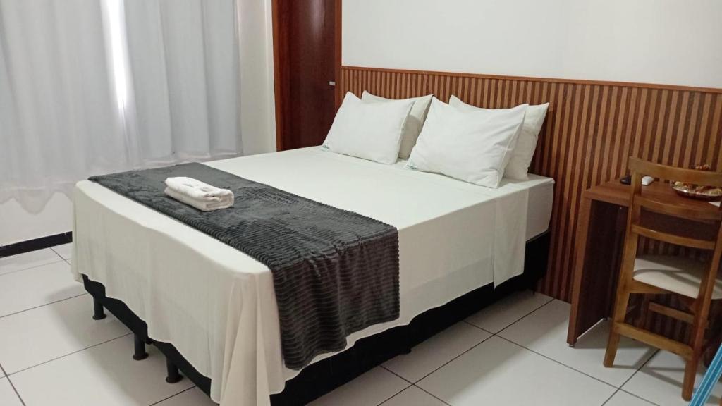 Postel nebo postele na pokoji v ubytování Hotel Itaberaba