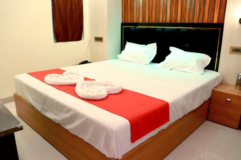 Postel nebo postele na pokoji v ubytování Golden View Hotel