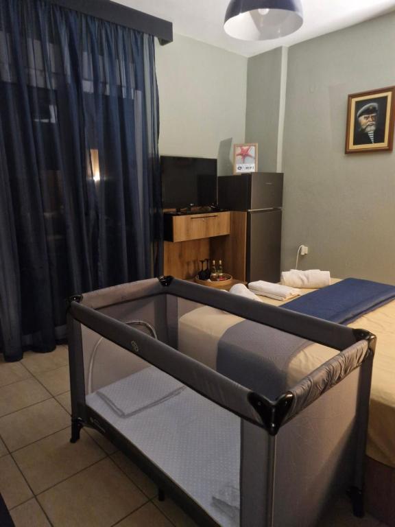 Postel nebo postele na pokoji v ubytování Julie Apartment