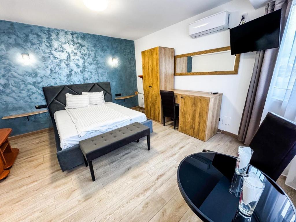TV a/nebo společenská místnost v ubytování Hotel Dalia