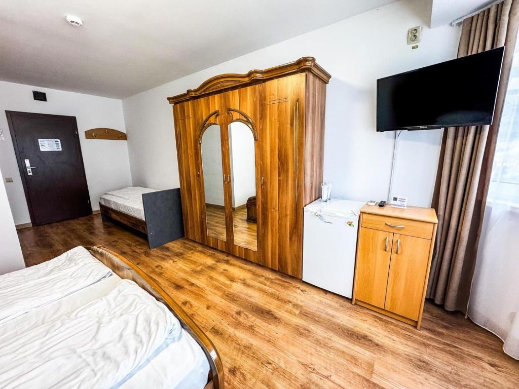 Postel nebo postele na pokoji v ubytování Hotel Dalia
