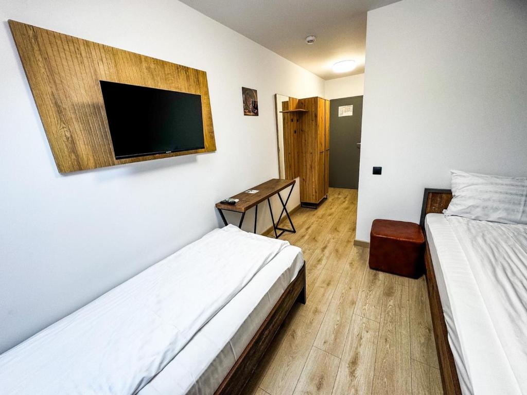 Postel nebo postele na pokoji v ubytování Hotel Dalia