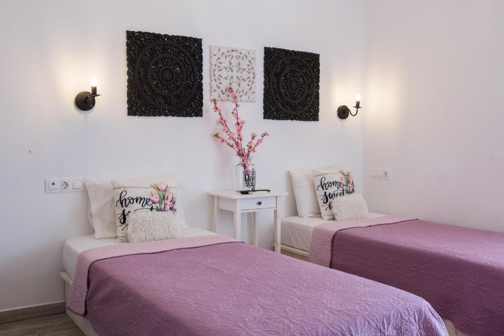 Postel nebo postele na pokoji v ubytování EvaEle Luxury Apartments