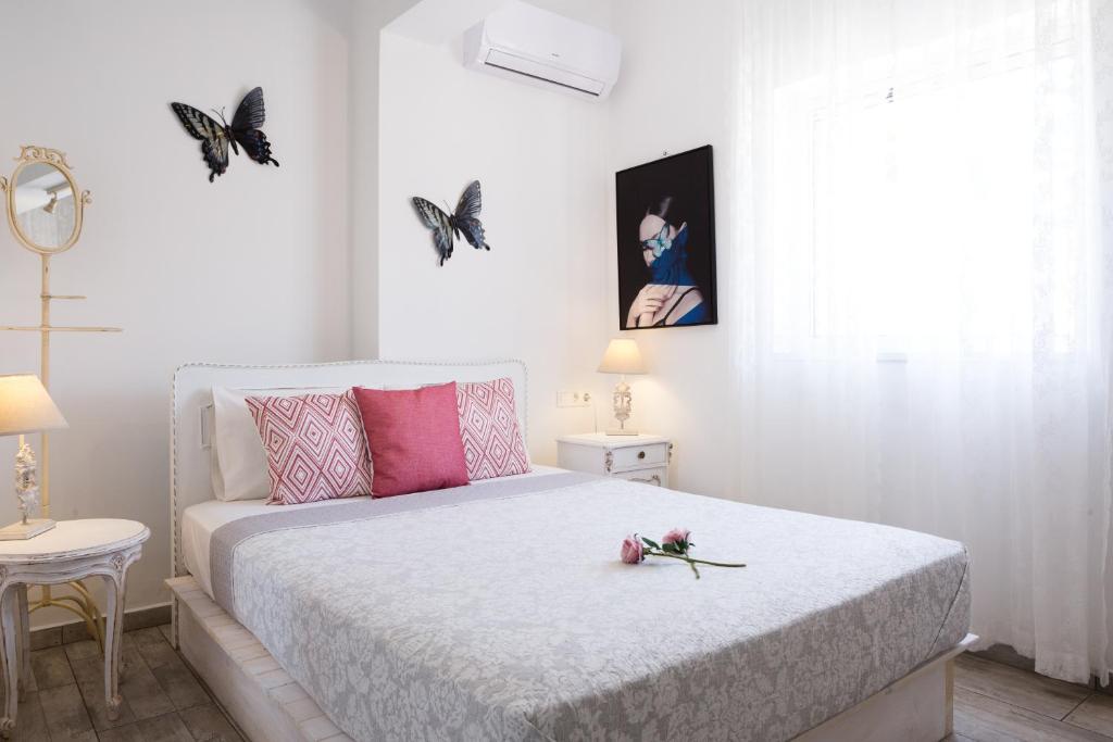 Postel nebo postele na pokoji v ubytování EvaEle Luxury Apartments
