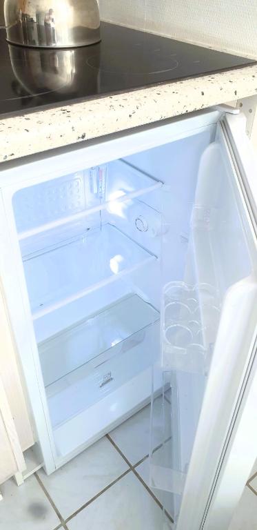 Kuchyň nebo kuchyňský kout v ubytování COZY VOGI Flat