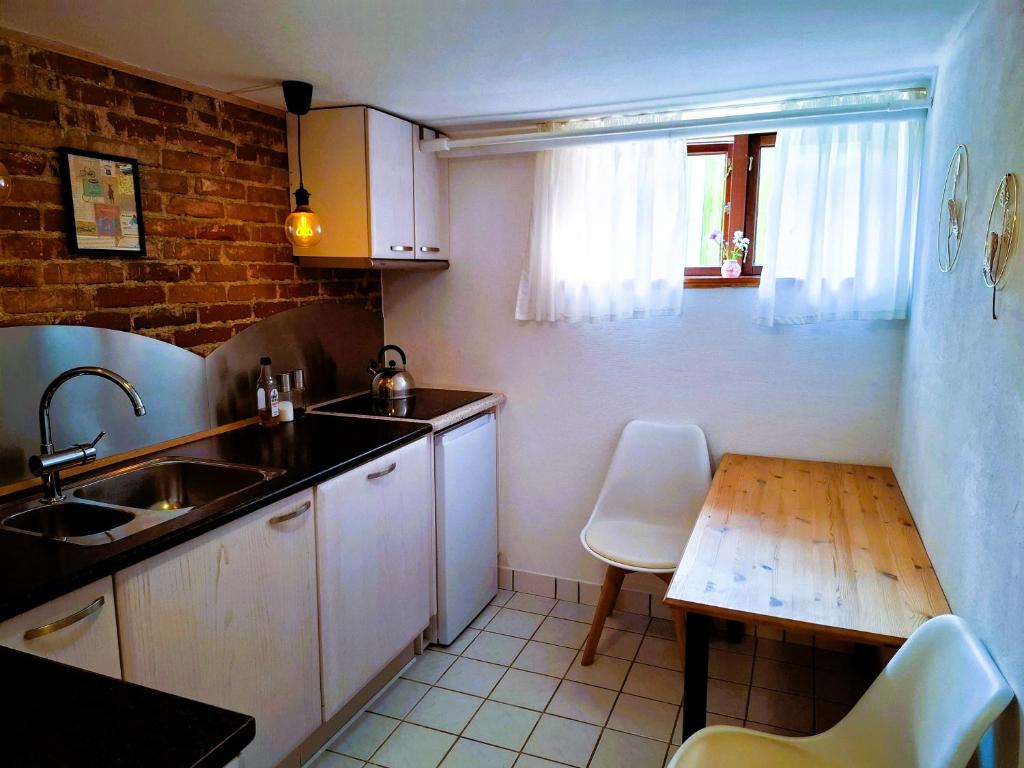 Kuchyň nebo kuchyňský kout v ubytování COZY VOGI Flat