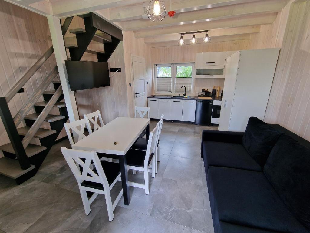 Χώρος καθιστικού στο Domki Nadmorskie Tycjanowo