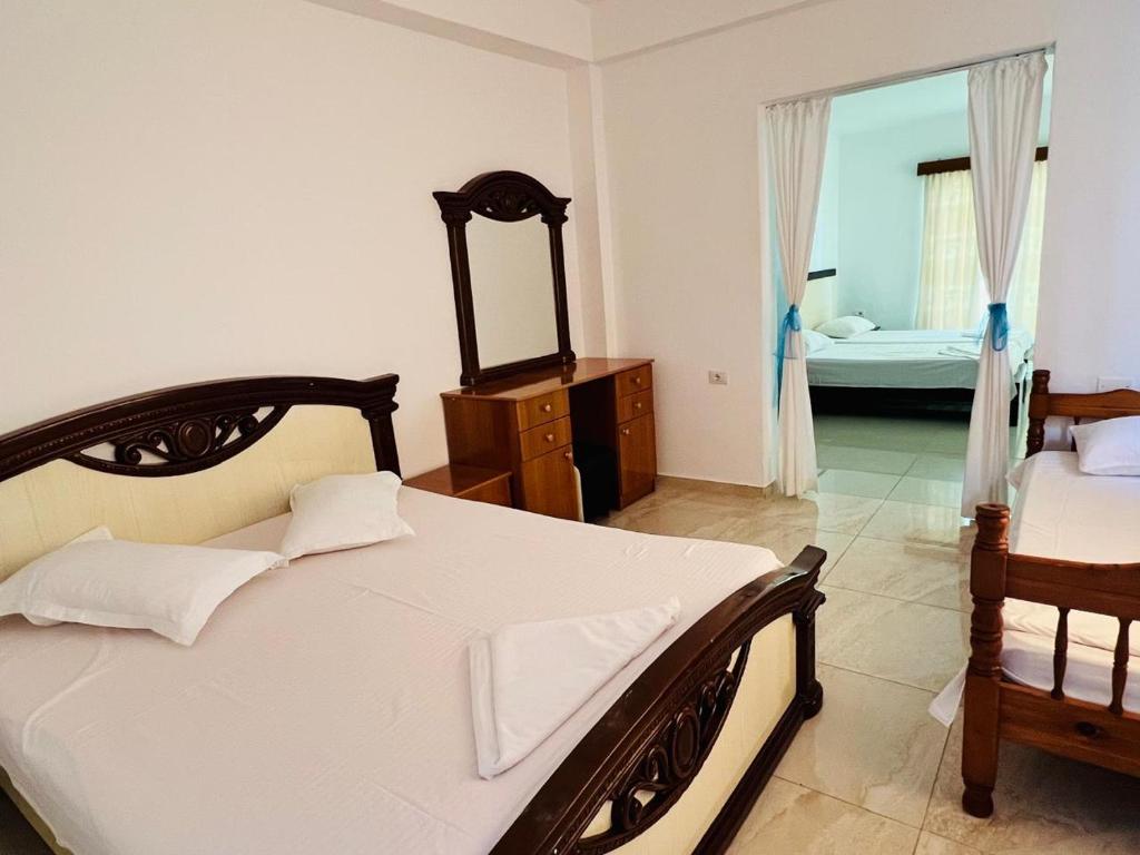 Postel nebo postele na pokoji v ubytování Hotel Jonufra