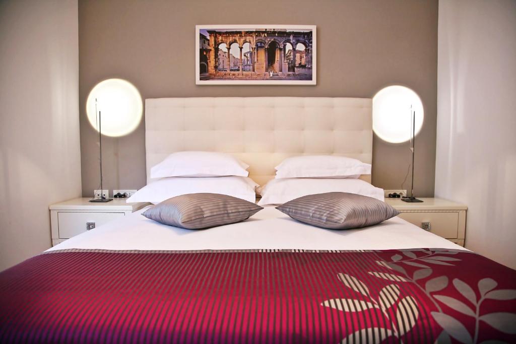 Krevet ili kreveti u jedinici u okviru objekta Magnolia Luxury Apartments