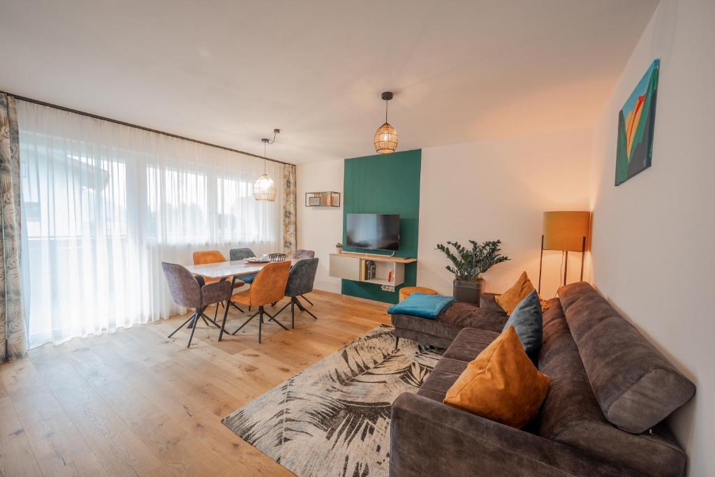 TV a/nebo společenská místnost v ubytování T-Collection Premium Apartments