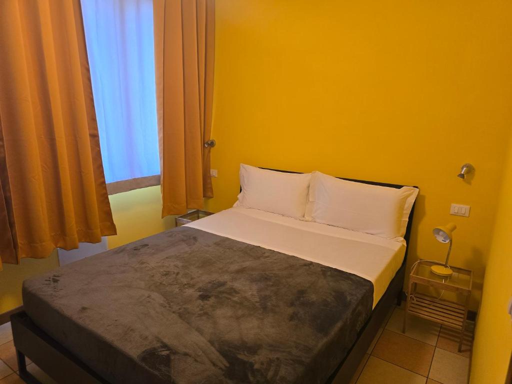 Postel nebo postele na pokoji v ubytování Marconi Lodge