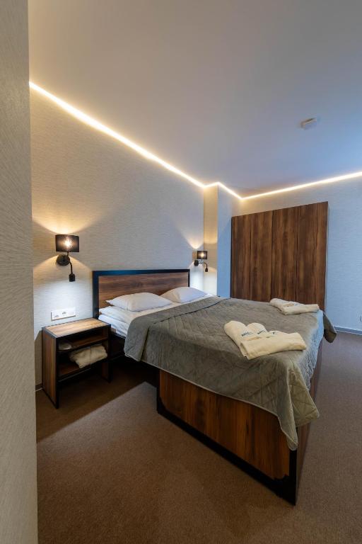 Postel nebo postele na pokoji v ubytování MISTO capsule hotel