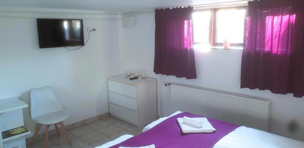 Postel nebo postele na pokoji v ubytování COZY VOGI Flat