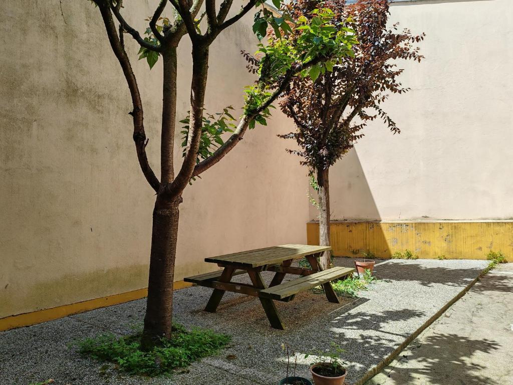 Aed väljaspool majutusasutust Arènes 2 à deux pas du centre historique