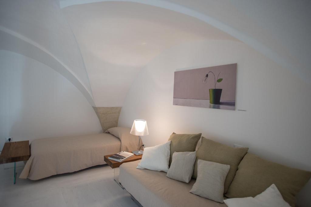 Posezení v ubytování Corte Campanile Boutique B&B
