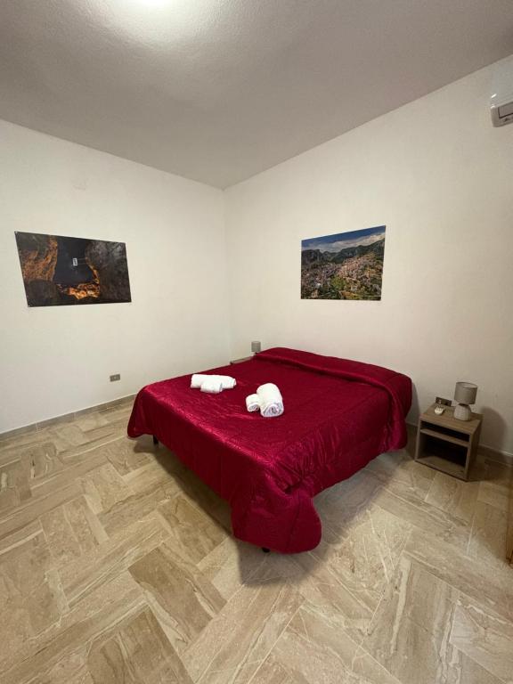 Postel nebo postele na pokoji v ubytování Il Rifugio delle Cascate