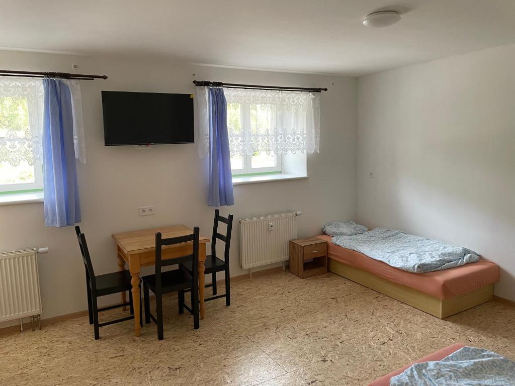 Postel nebo postele na pokoji v ubytování Apartmány J L A