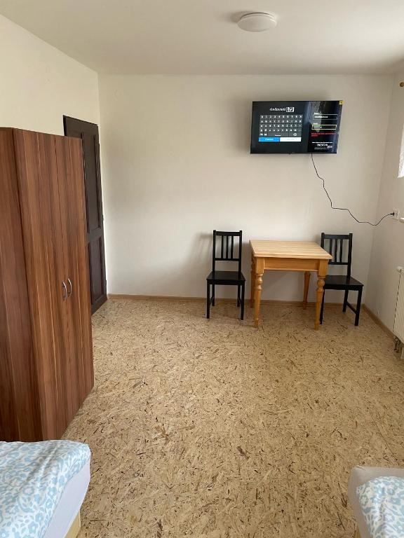 TV a/nebo společenská místnost v ubytování Apartmány J L A