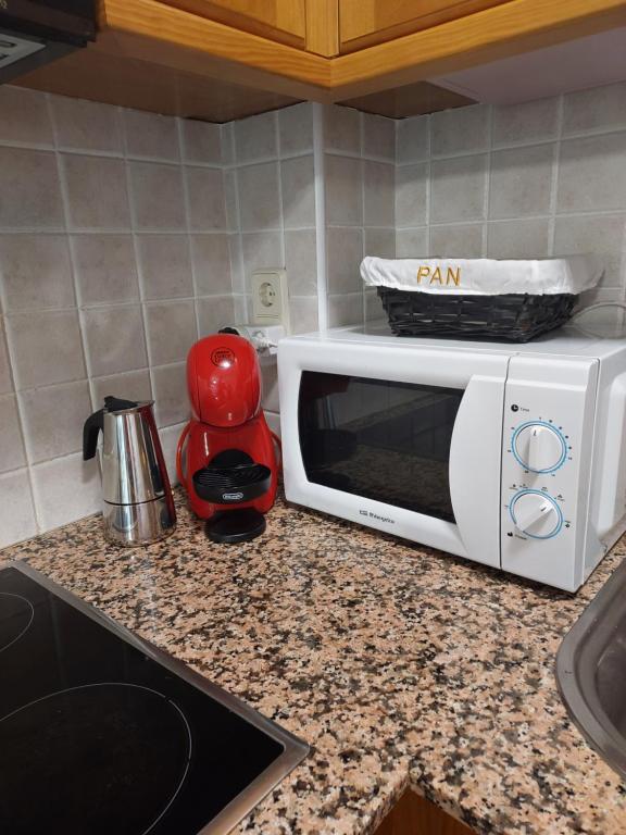 Kuchyň nebo kuchyňský kout v ubytování Duplex La Vinya