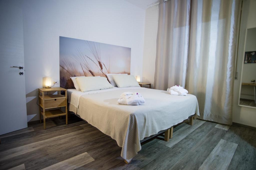 Postel nebo postele na pokoji v ubytování B&B Hill Ranch