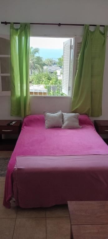 Postel nebo postele na pokoji v ubytování NOVOS Departamentos Temporarios Catamarca apart