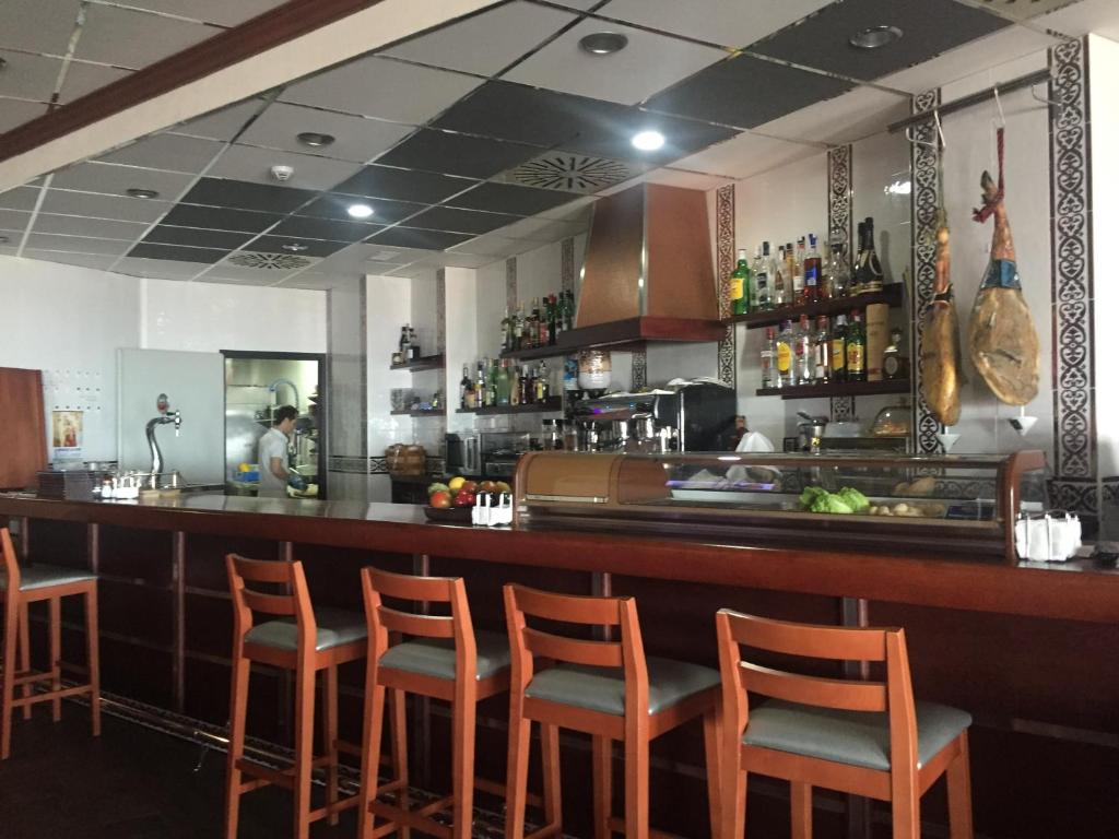 Lounge nebo bar v ubytování Hotel La Familia