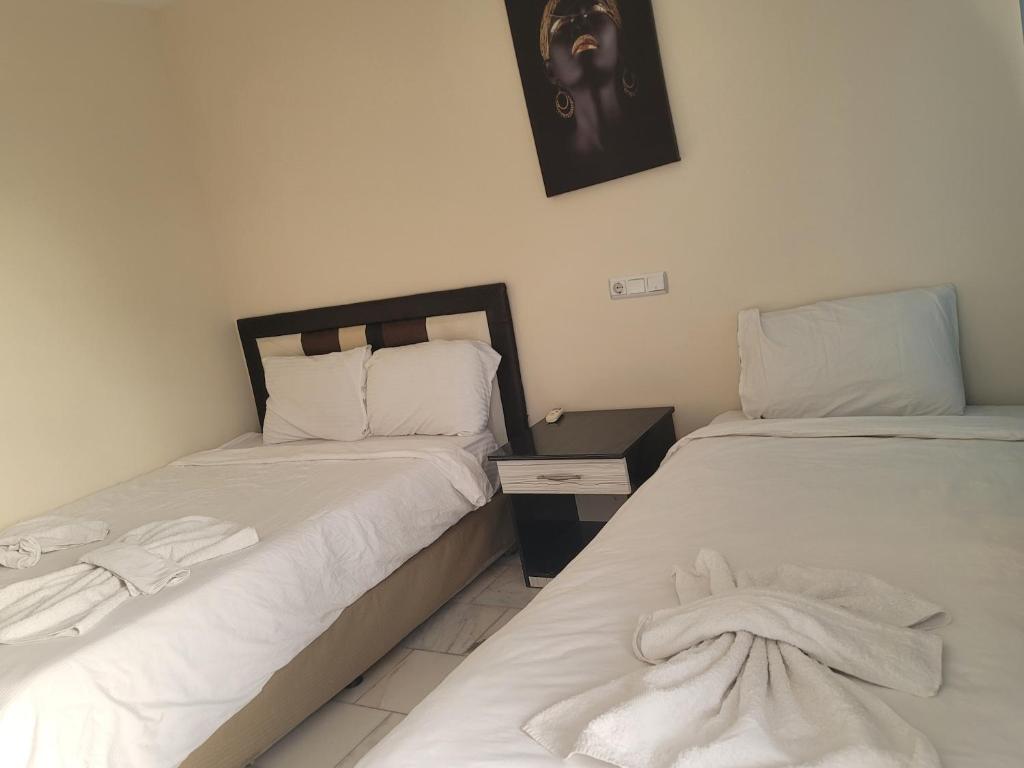 Postel nebo postele na pokoji v ubytování shah sultan Ozturk Hotel