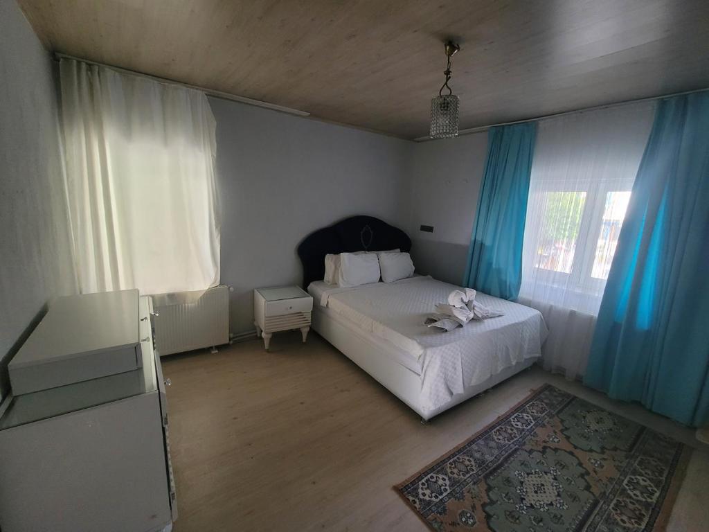 Postel nebo postele na pokoji v ubytování shah sultan Ozturk Hotel