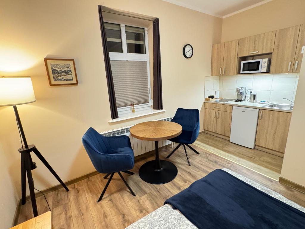 Kuchyňa alebo kuchynka v ubytovaní Przystanek Rabka - Apartamenty w centrum