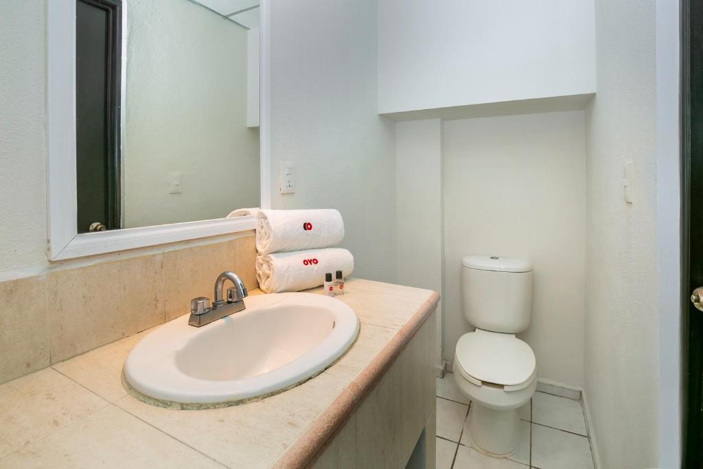 Koupelna v ubytování Capital O Hotel Victoria Morelia