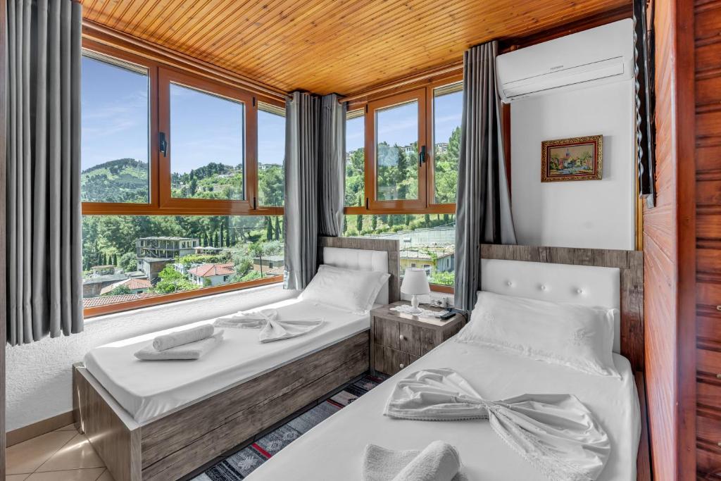 Postel nebo postele na pokoji v ubytování Guesthouse Emiljano
