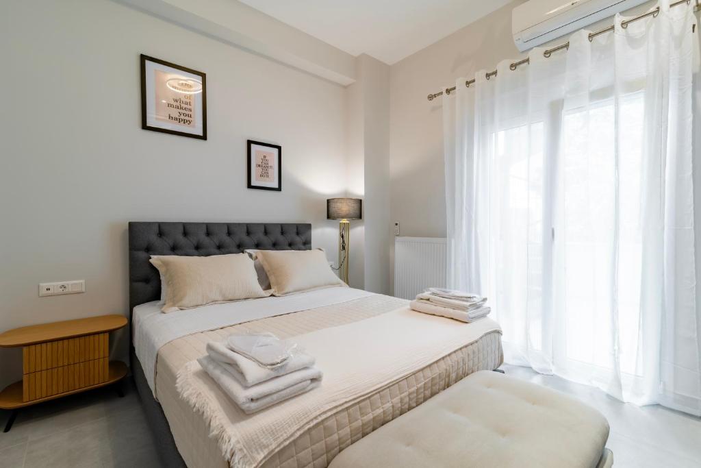 Ένα ή περισσότερα κρεβάτια σε δωμάτιο στο Electra's apartments