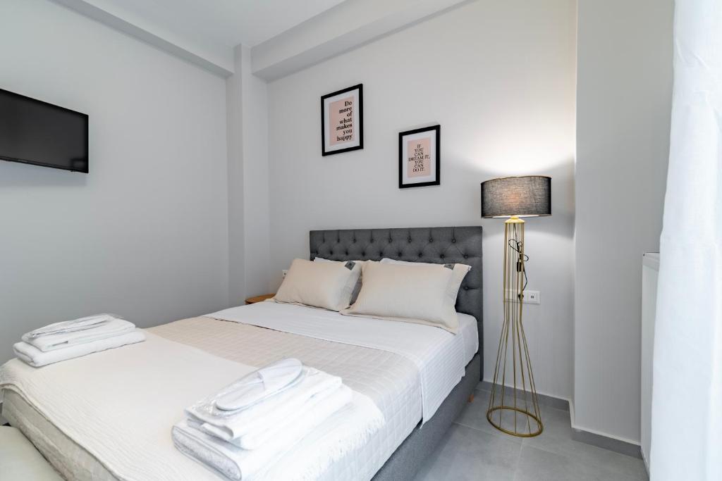 Postel nebo postele na pokoji v ubytování Electra's apartments