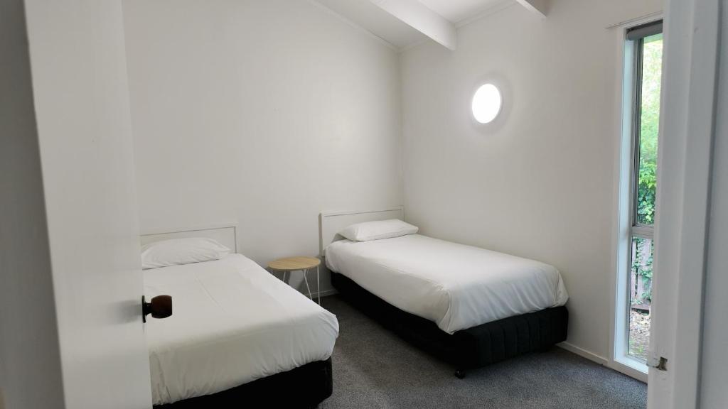 Postel nebo postele na pokoji v ubytování Siesta Motel