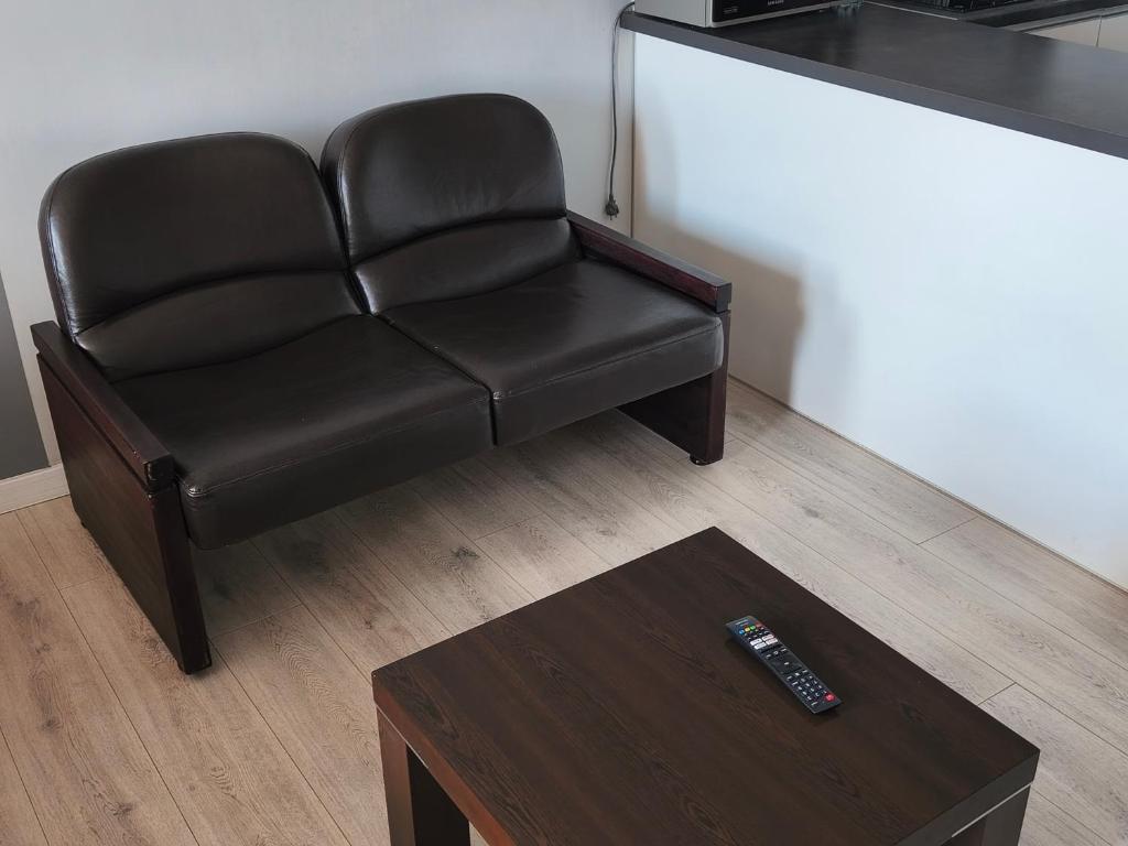 Posezení v ubytování WRN APARTAMENTY