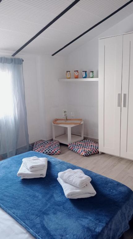 Posteľ alebo postele v izbe v ubytovaní Estancia de Invitados de Casa Tais
