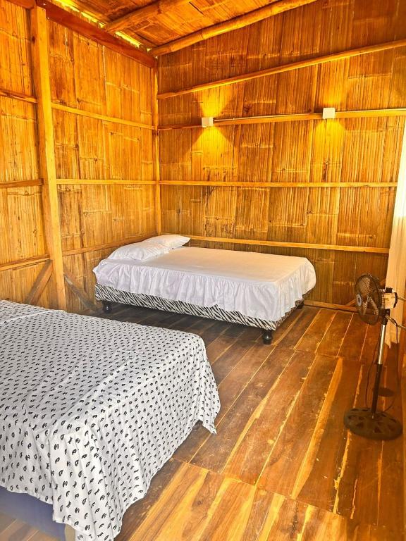 Postel nebo postele na pokoji v ubytování HotelCascol
