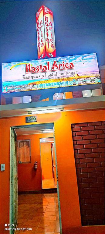 アリカにあるHostal copa Arica 2の建物内の病院入口の標識