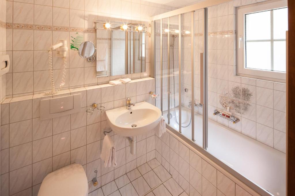 Koupelna v ubytování Hotel Cheminee
