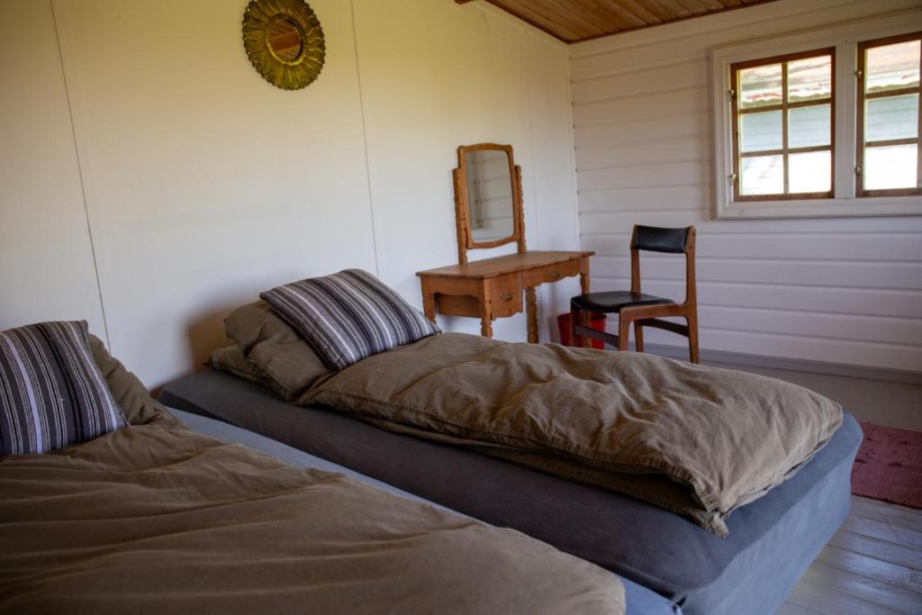 Voodi või voodid majutusasutuse Langeland Camping toas