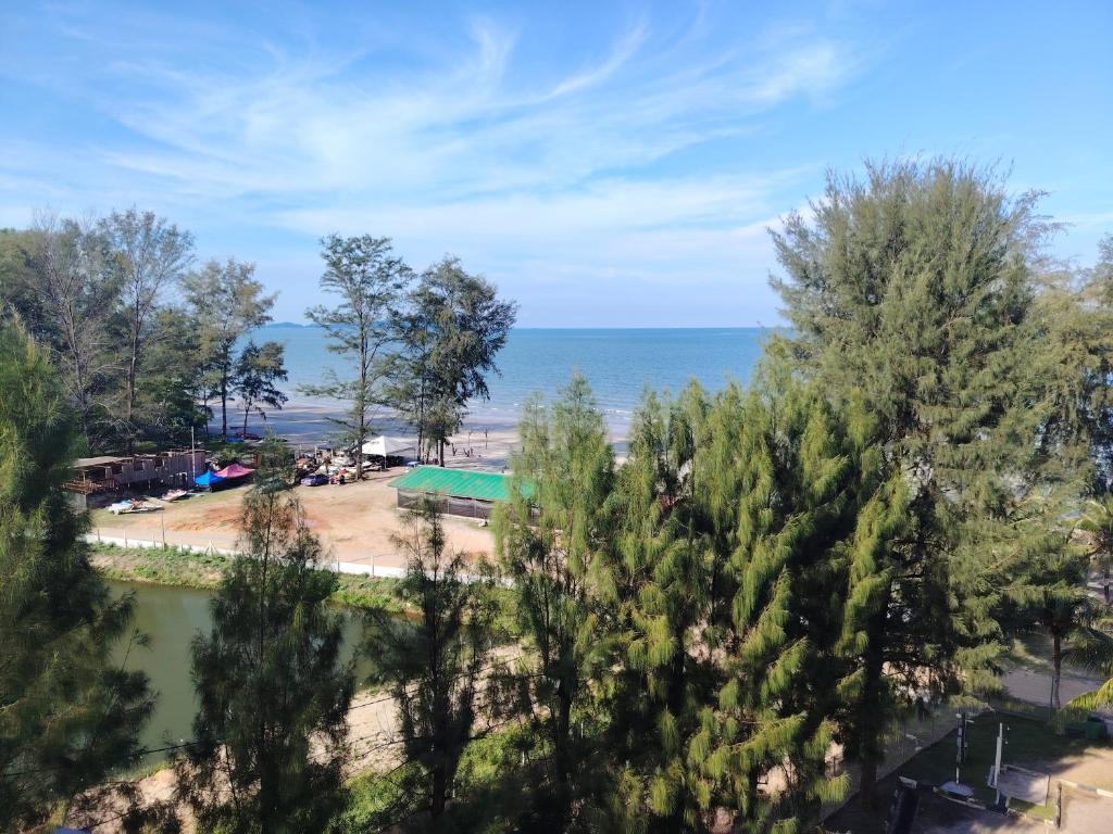 a view of a beach and the ocean at Swiss Garden resort residence by Moonlight in Kuantan