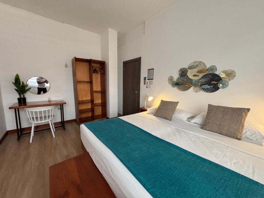 Postel nebo postele na pokoji v ubytování Casa D´Cristhi