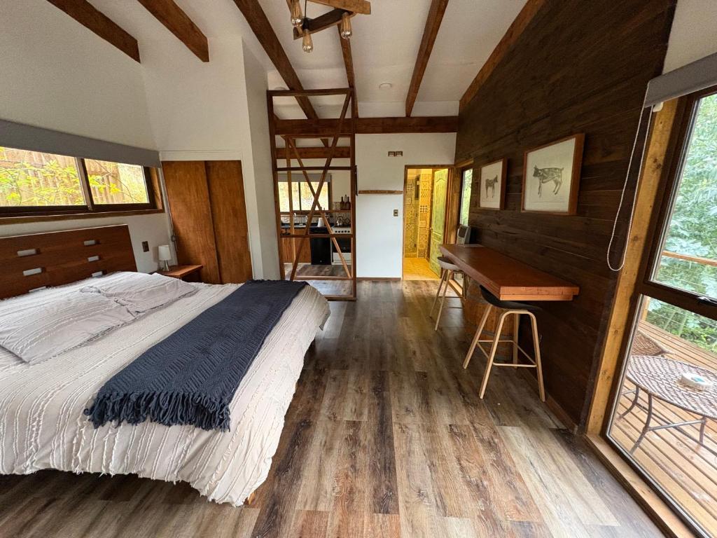 Postel nebo postele na pokoji v ubytování cabaña con tinaja en viña narbona wines