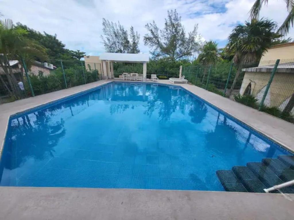 Bazén v ubytování Casa en la zona hotelera a 5 min de la playa nebo v jeho okolí